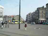 Yellow streetcars passing