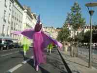 Costumed people on stilts