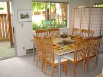 Dining room with table set for eight