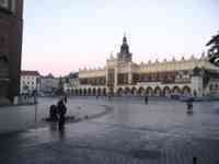 Open plaza and central market building on a damp morning