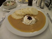 Roast beef with cream sauce and dumplings