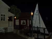 Small buildings and sailboat